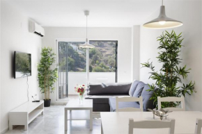 Charming 2-Bedroom Apartment with Terraces & Pool in Torrequebrada